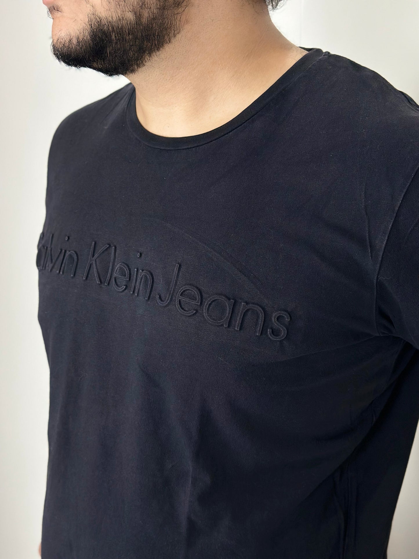CK Logo Embossed Black T Shirt | Size: XL